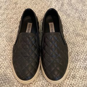Steve Madden black quilted leather slip ons